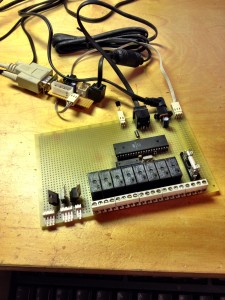The Neptune module being prototyped. Connected to a level converter (on top) to allow a normal PC to talk to the module.